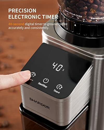 Close-up of a coffee grinder with precision electronic timer.