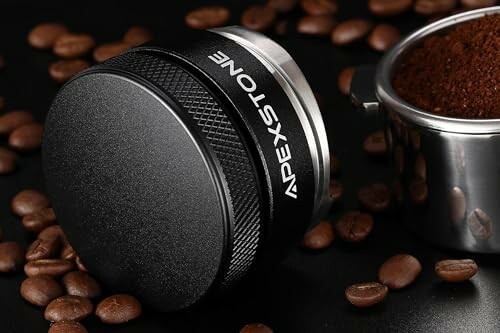 Coffee tamper tool with coffee beans and grounds