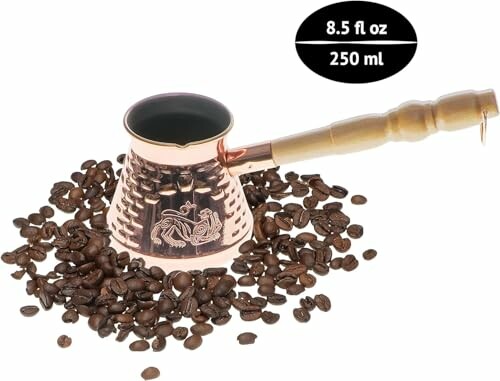 Copper cezve surrounded by coffee beans, 8.5 fl oz capacity.