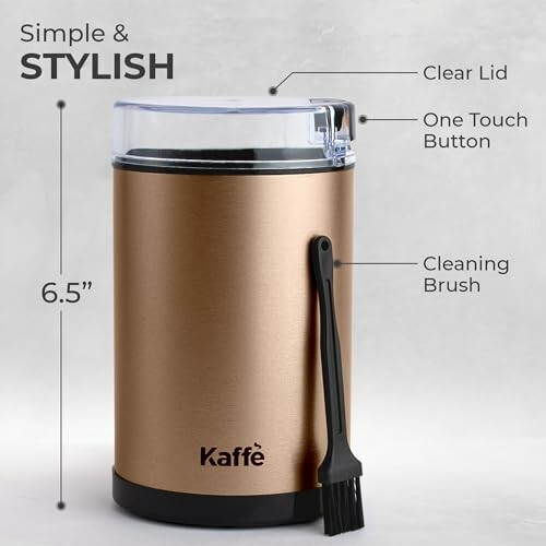 KaffÃÂÃÂÃÂÃÂÃÂÃÂÃÂÃÂÃÂÃÂÃÂÃÂÃÂÃÂÃÂÃÂ© coffee grinder with clear lid and cleaning brush.