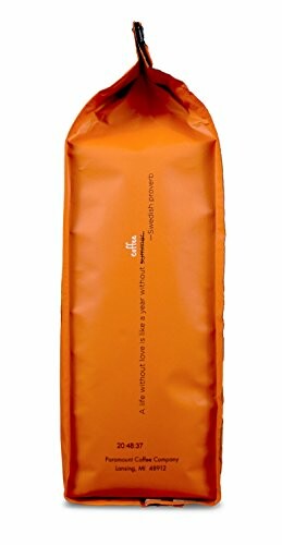 Orange coffee bag with text.